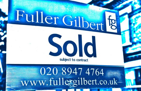 Property sold board outside a house