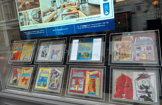 The Willcocks Nursery display their property window cards at Fuller Gilbert Estate Agents